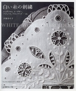 White thread embroidery